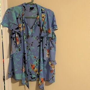 Blue floral blouse.